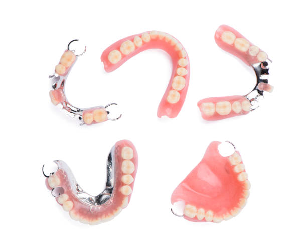 Set of dentures on white background.