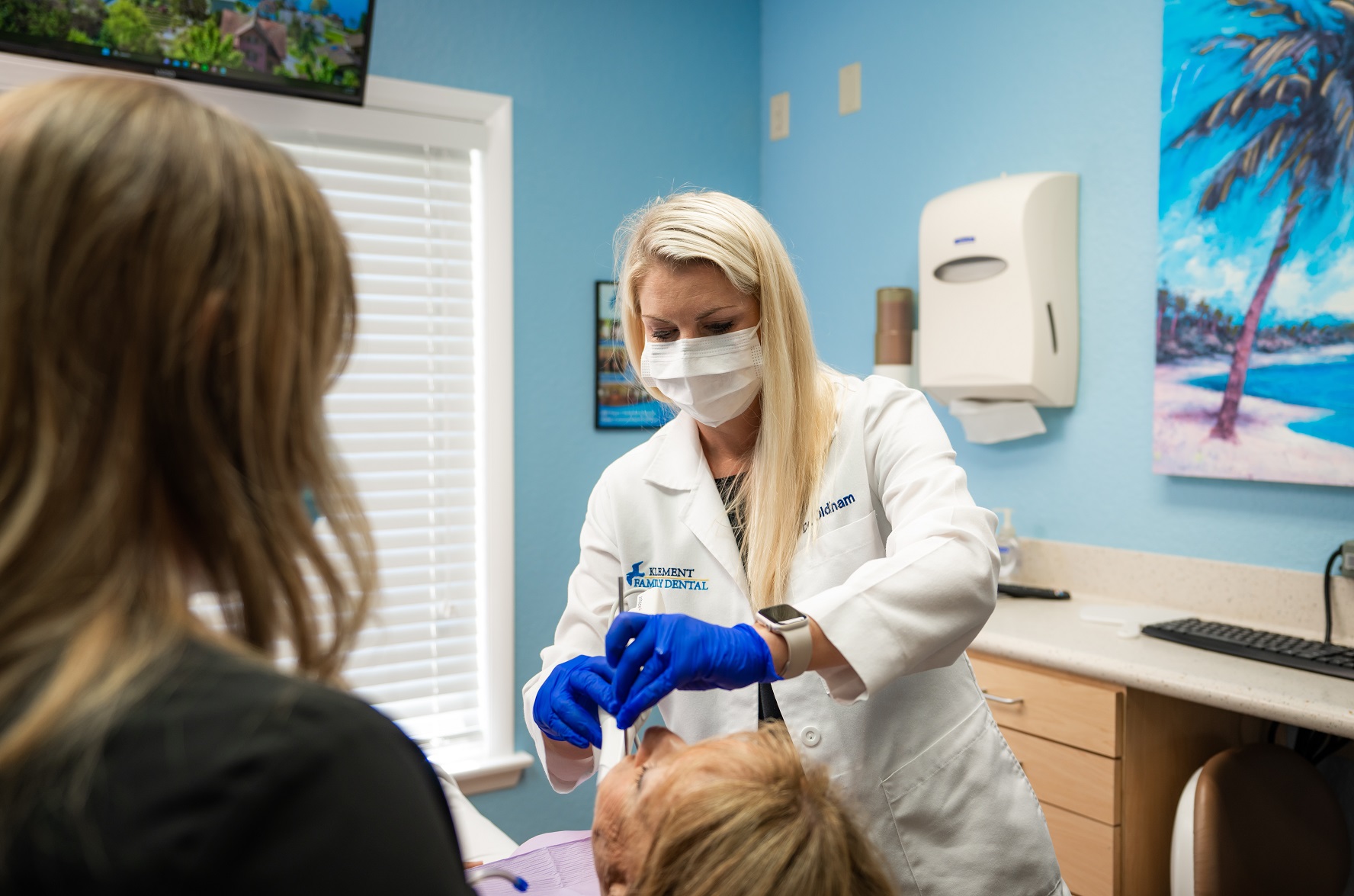 Dentist with patient