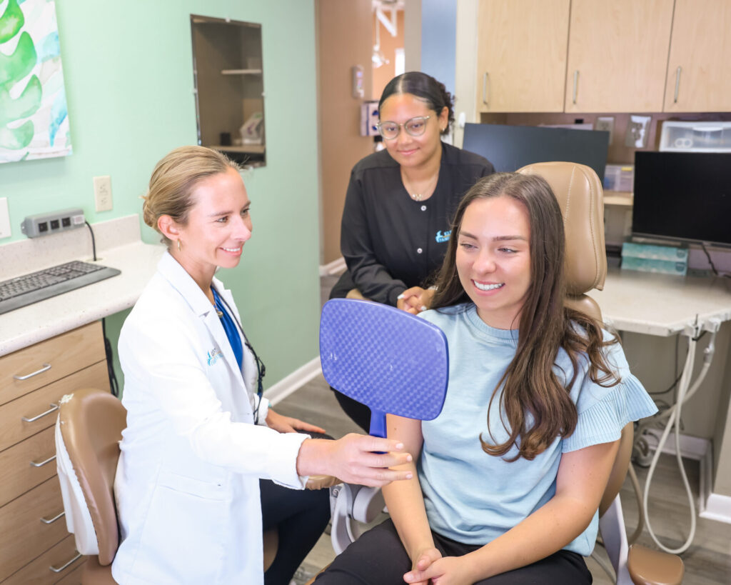 Dentist with patient